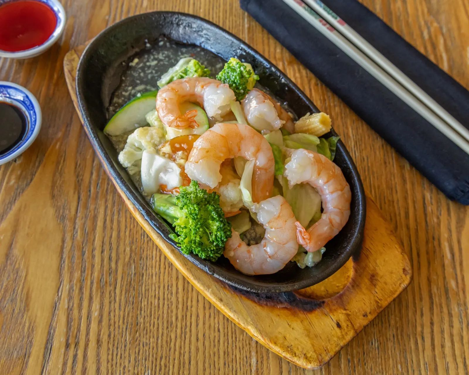 Garlic king prawns on sizzling plate